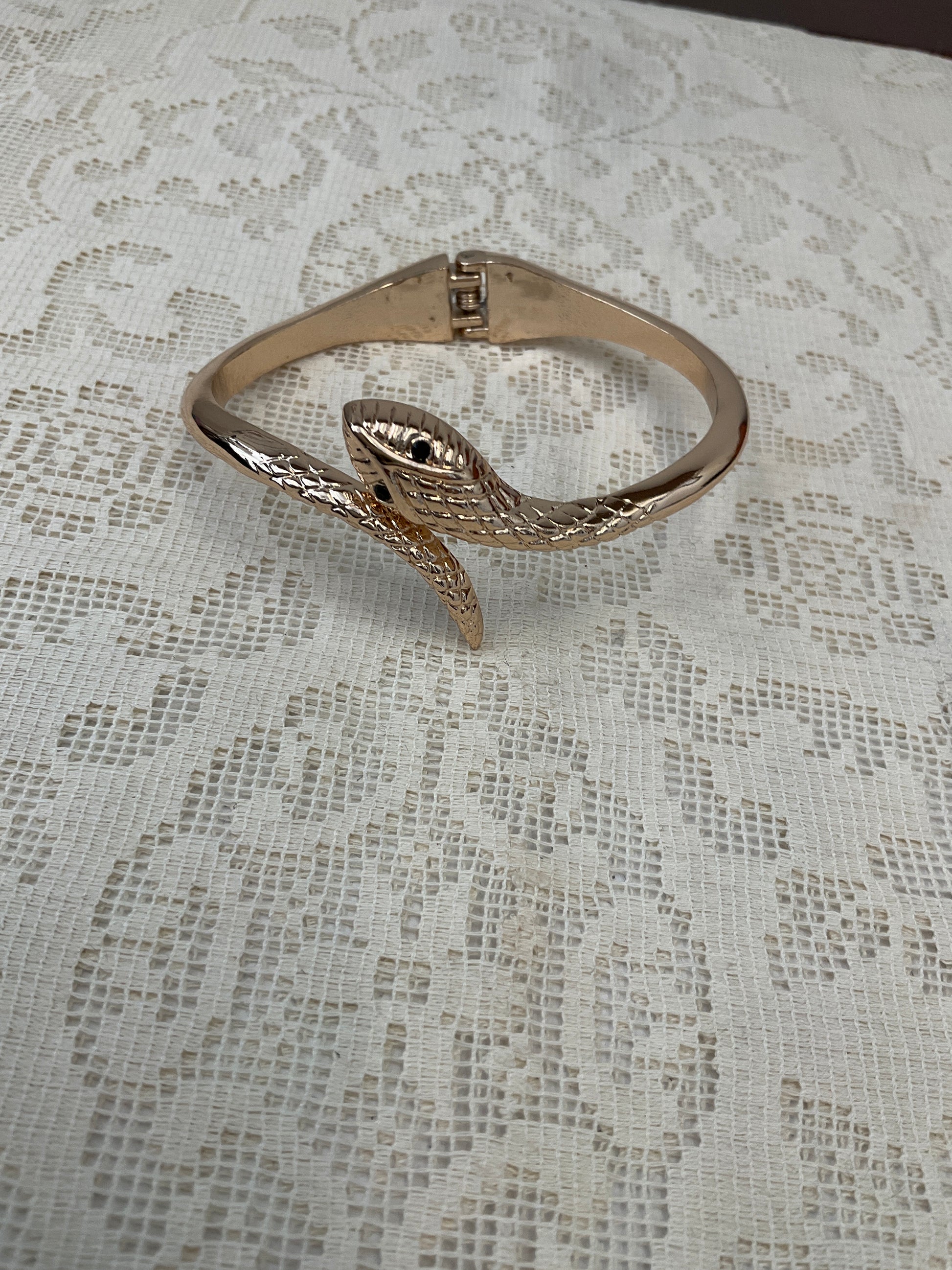 Gold snake cuff
