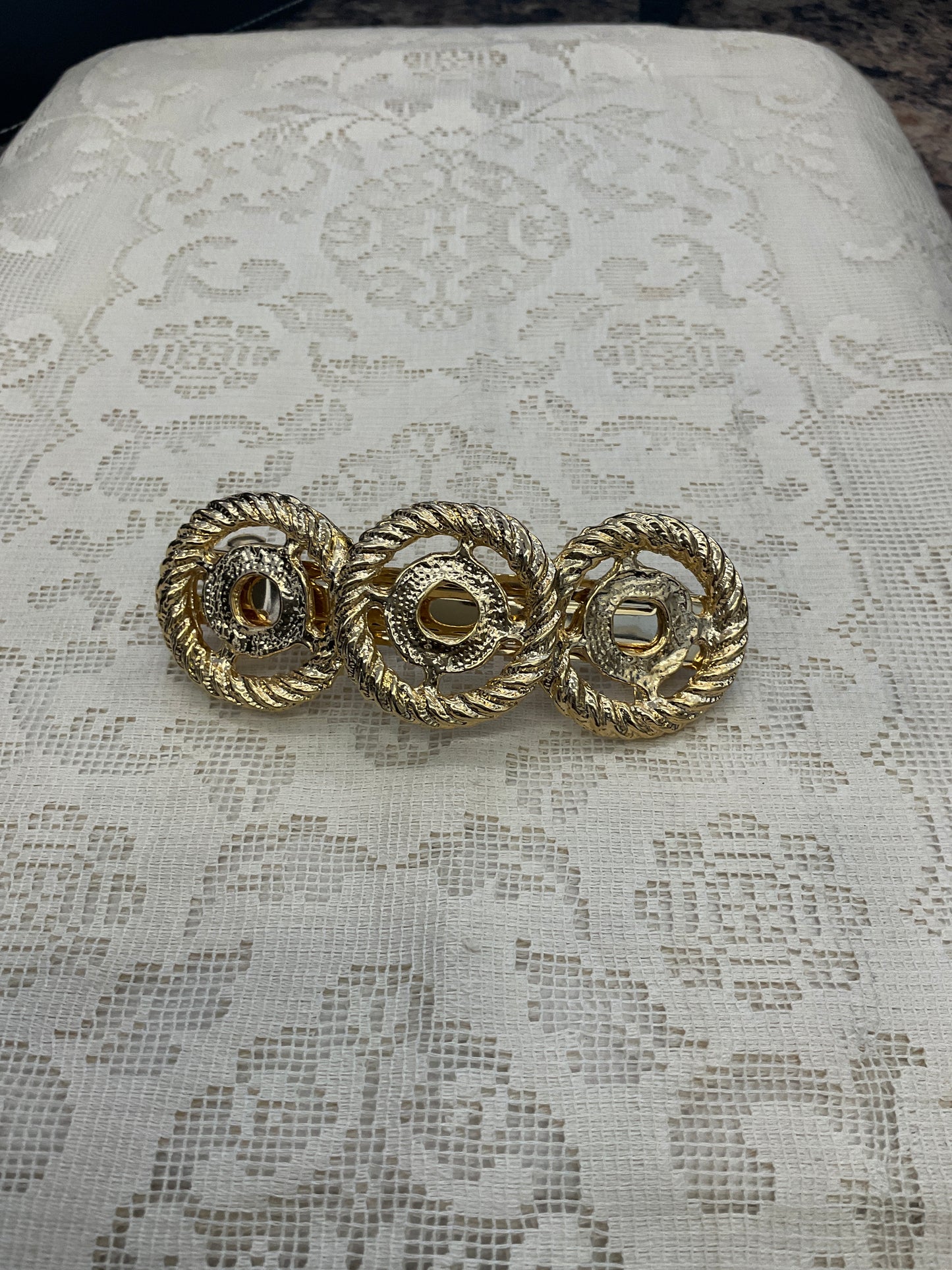 Gold circle hair barrette