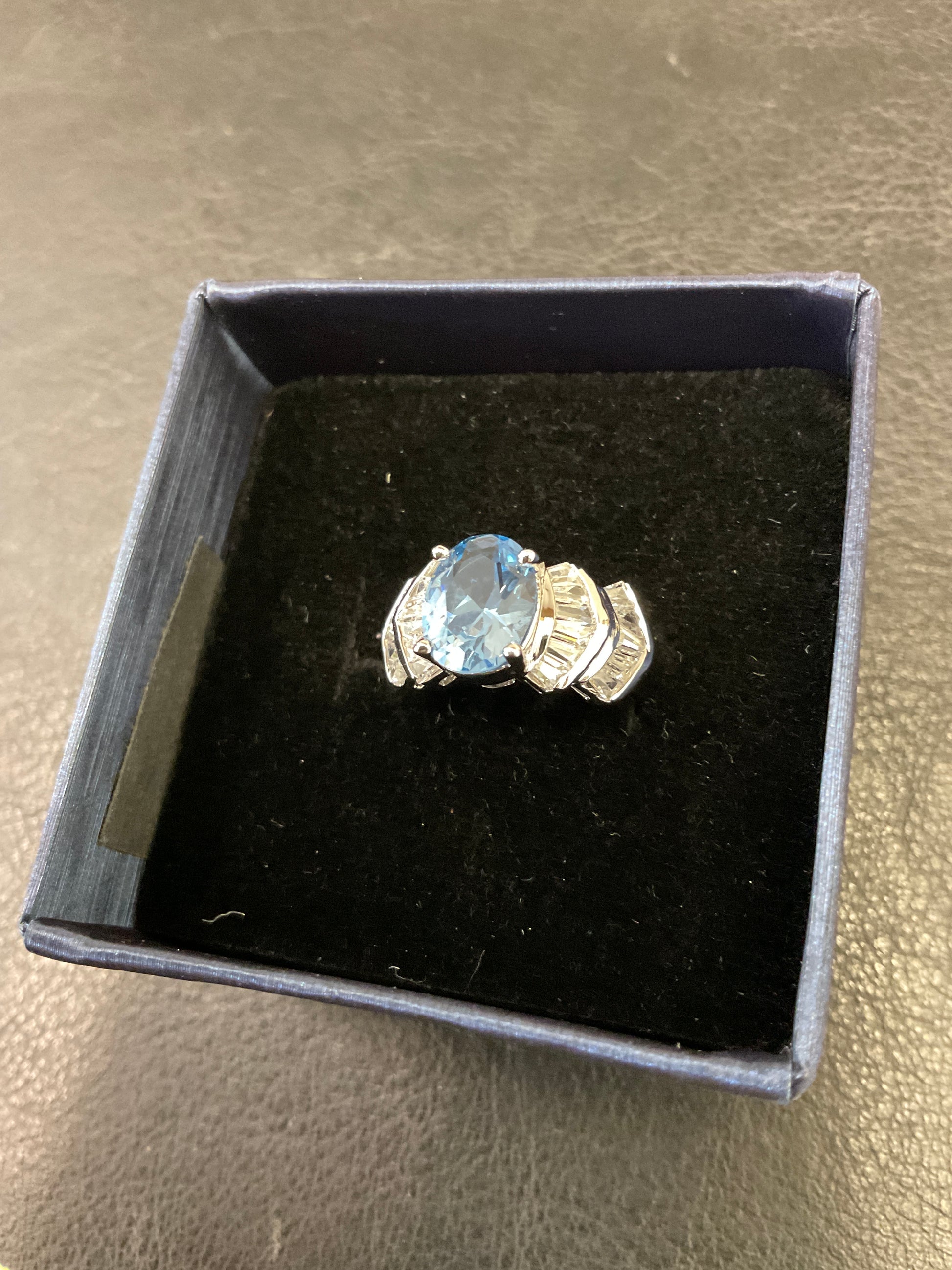 Delicate Swiss Blue Topaz Engagement Ring with Baguette Side Stones 925