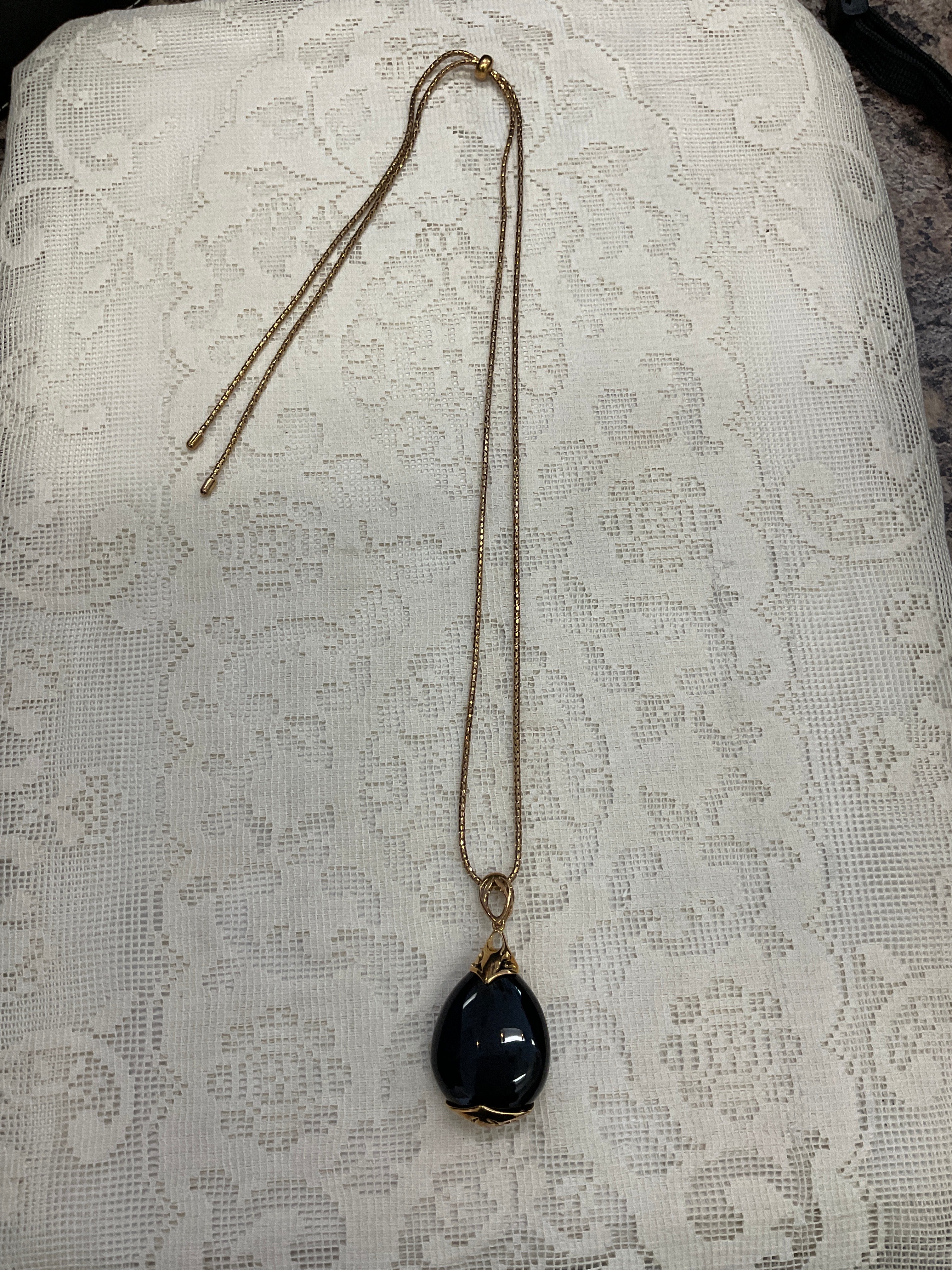 Gold with black stone adjustable neck