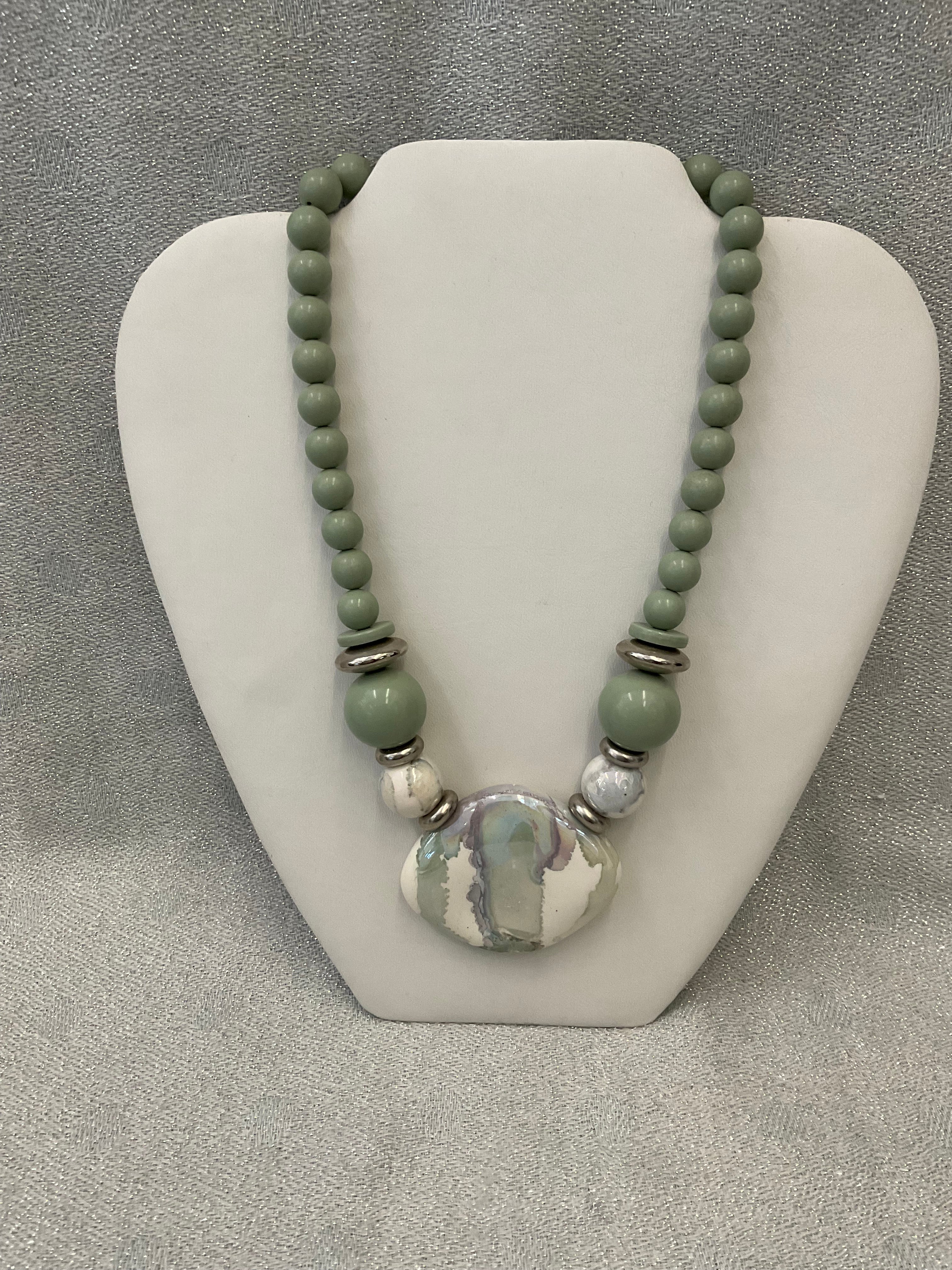 Green and white beaded necklace