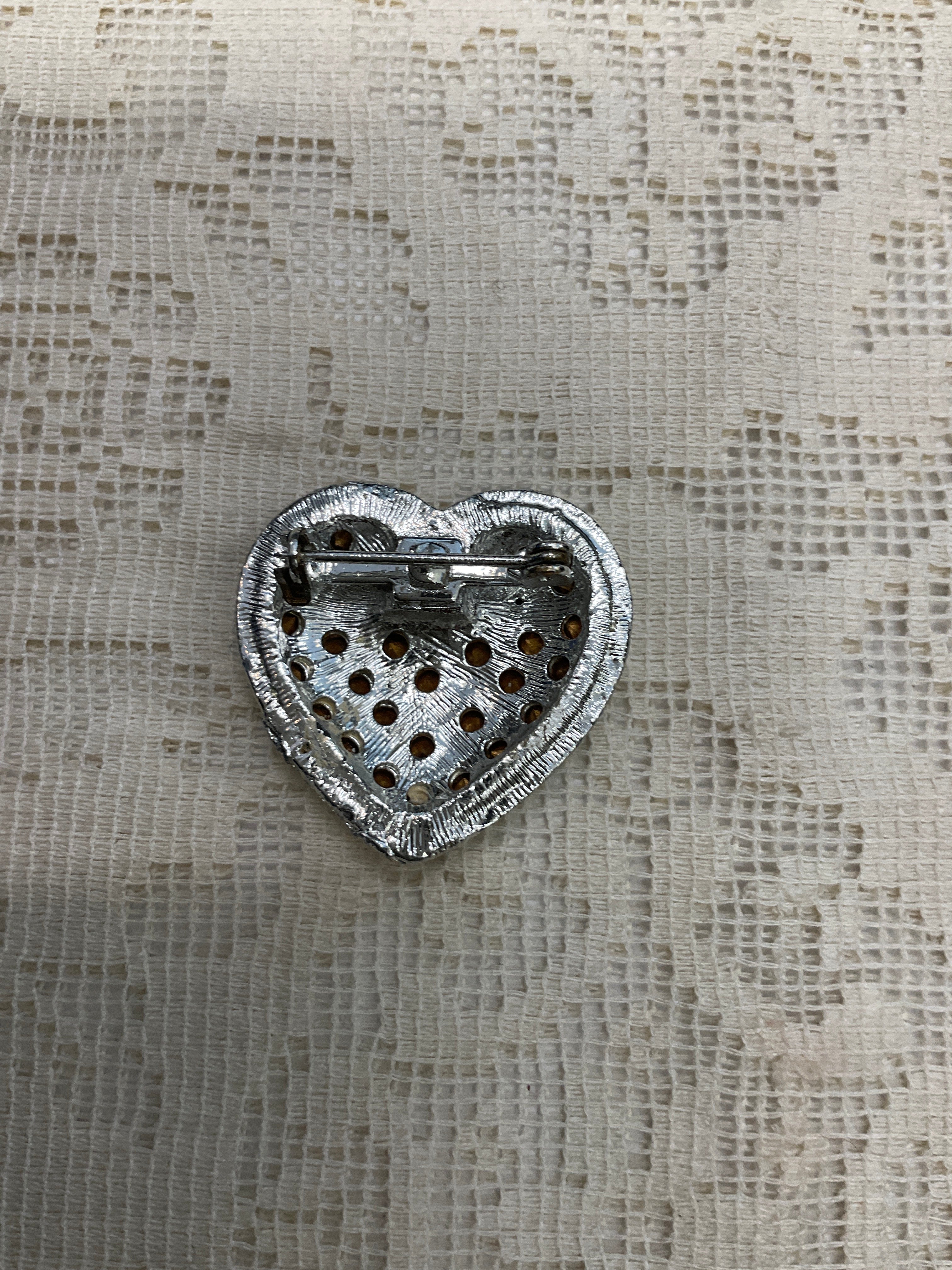Heart shaped silver broach pin