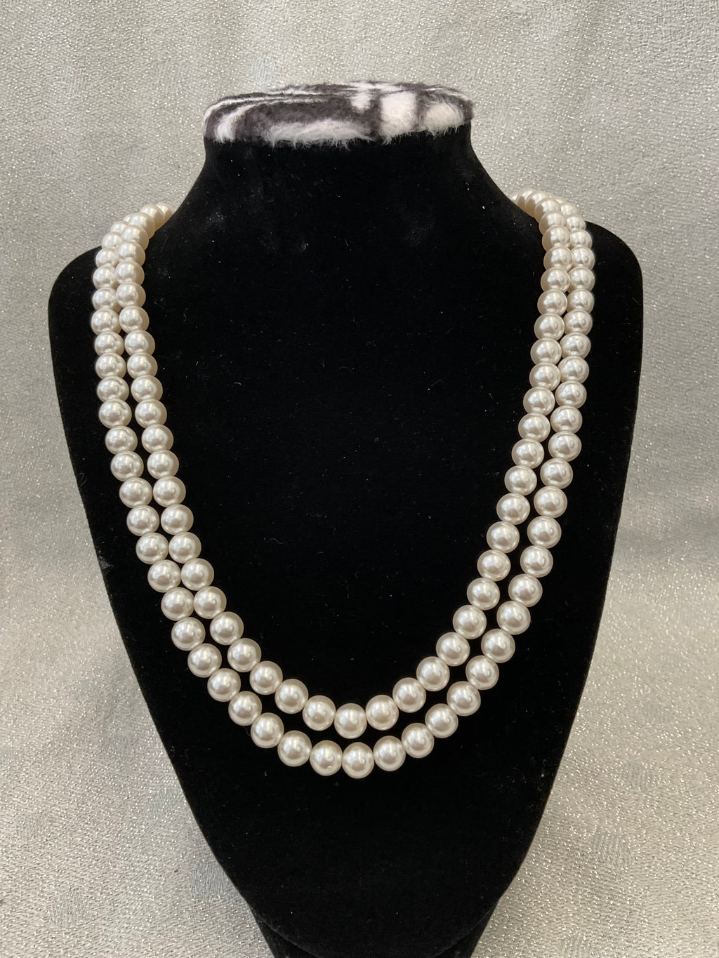 Double stranded pearl necklace