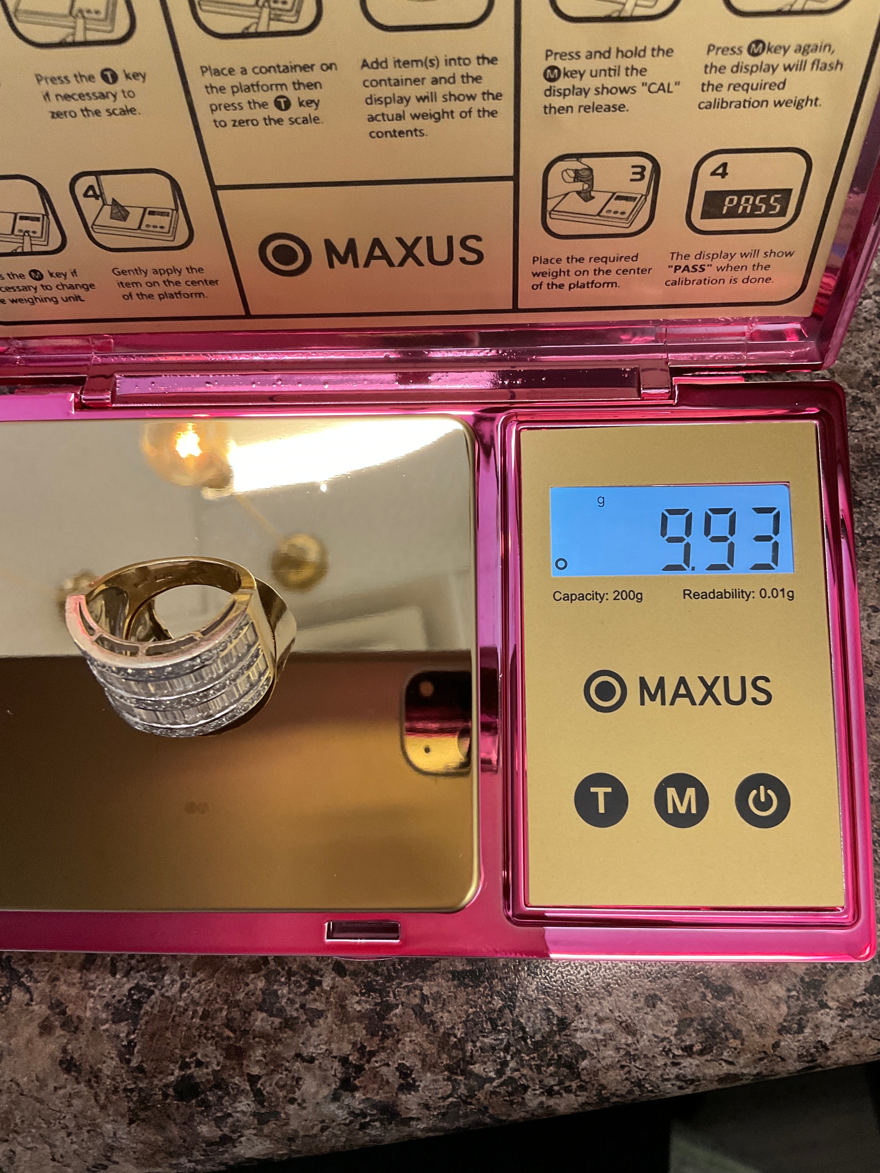 Size 6.5 14k gold with diamond baguettes in white gold setting 9.93 grams