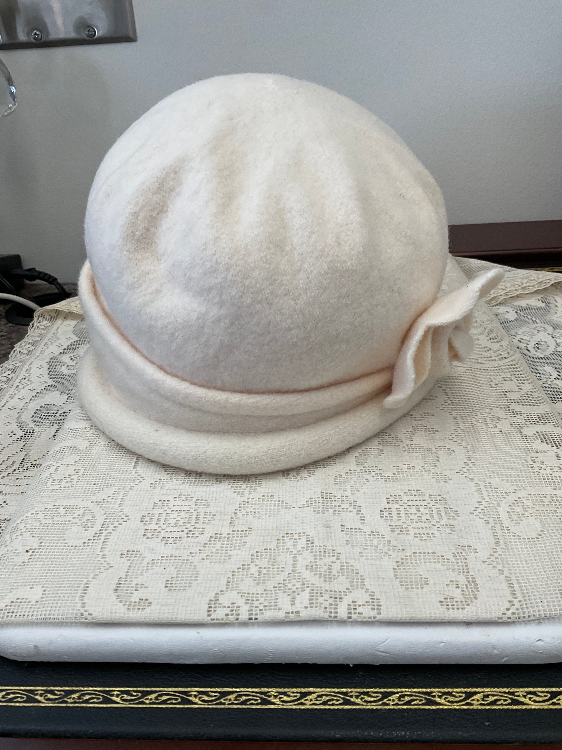 100% wool slouch hat with flower accent