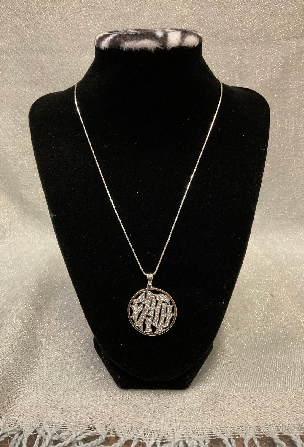 Silver ‘Faith’ pendent necklace