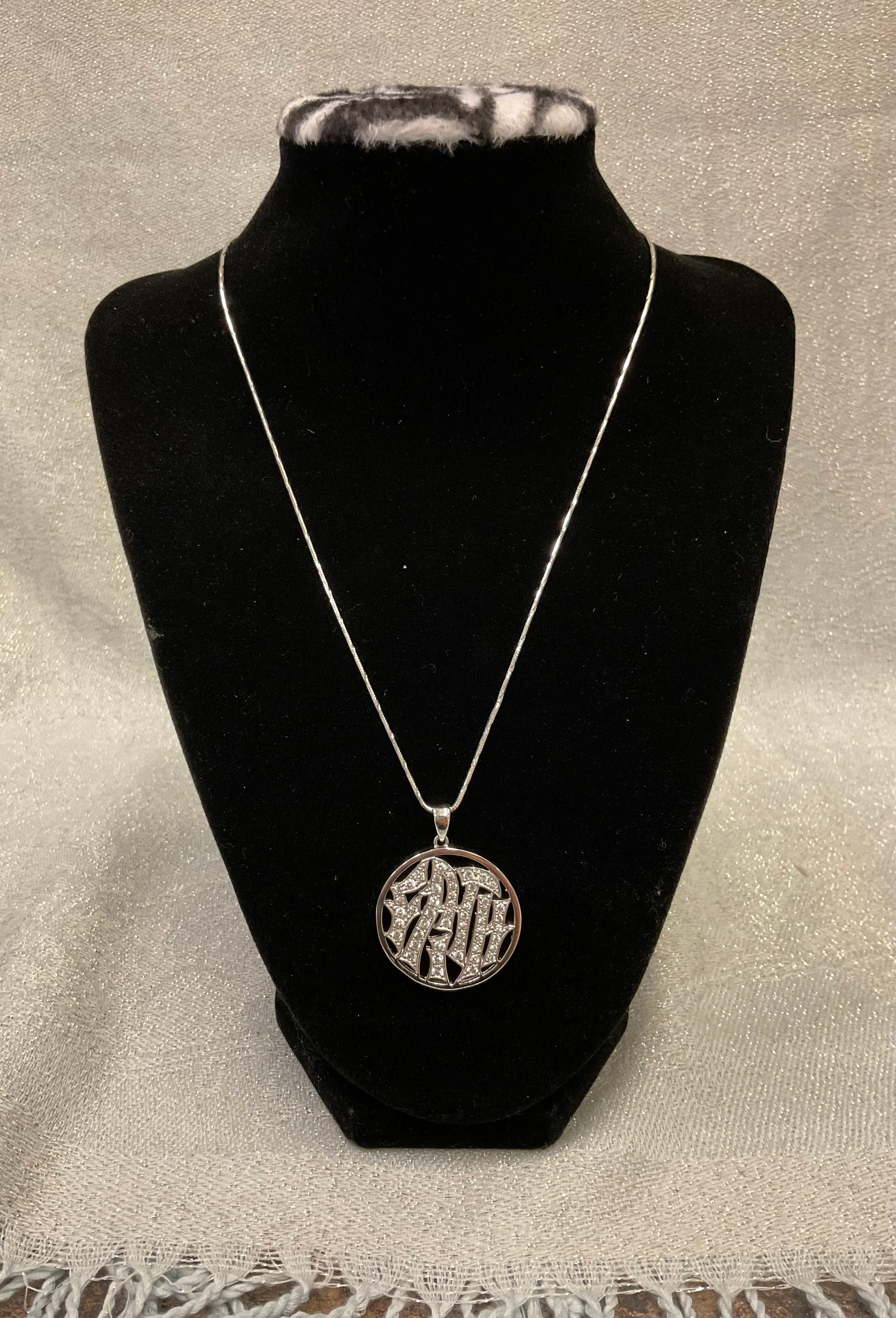 Silver ‘Faith’ pendent necklace