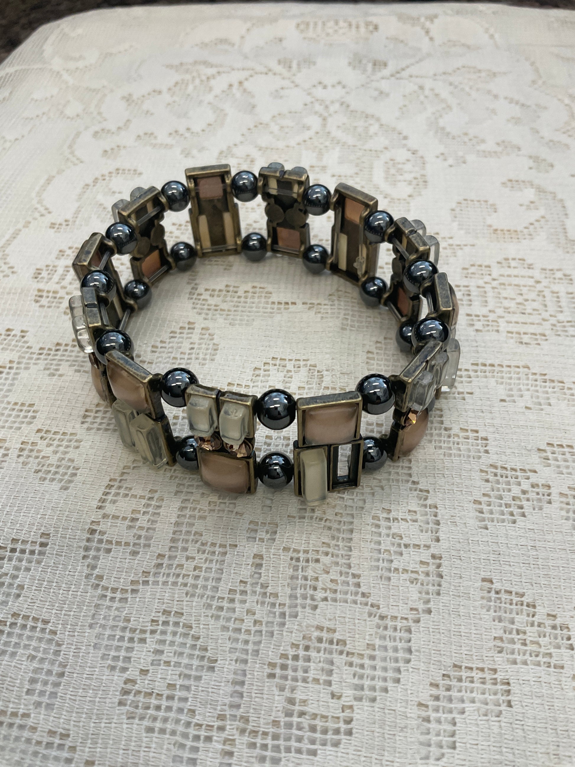 Gold toned bracelet with beads