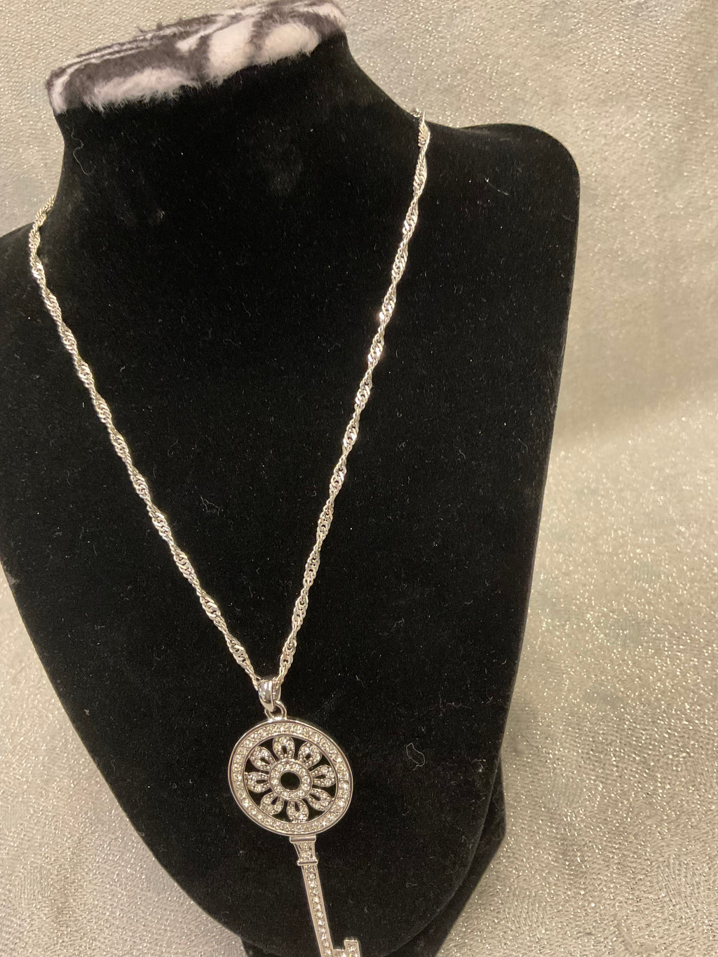 Silver necklace with large key pendant