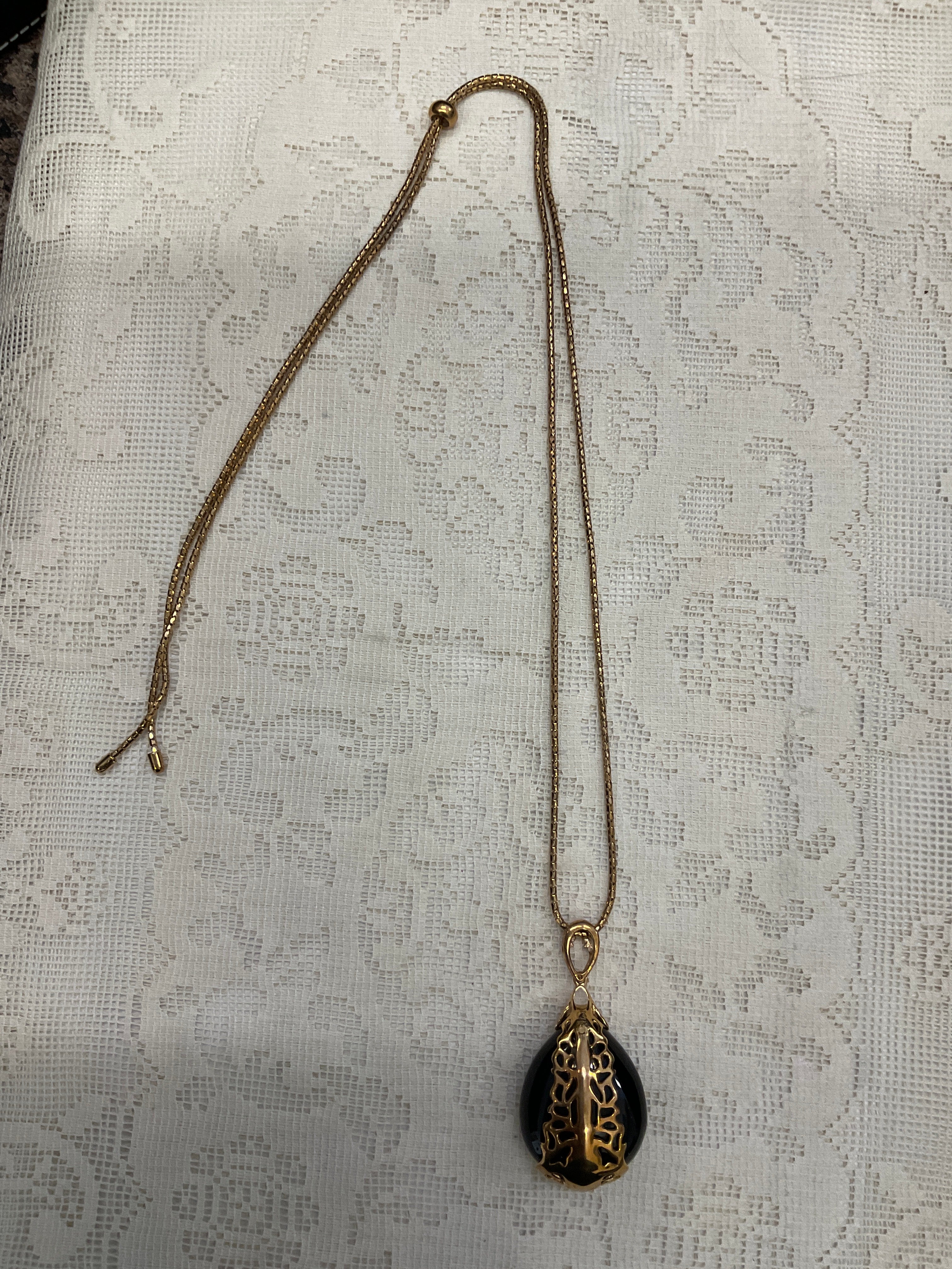 Gold with black stone adjustable neck