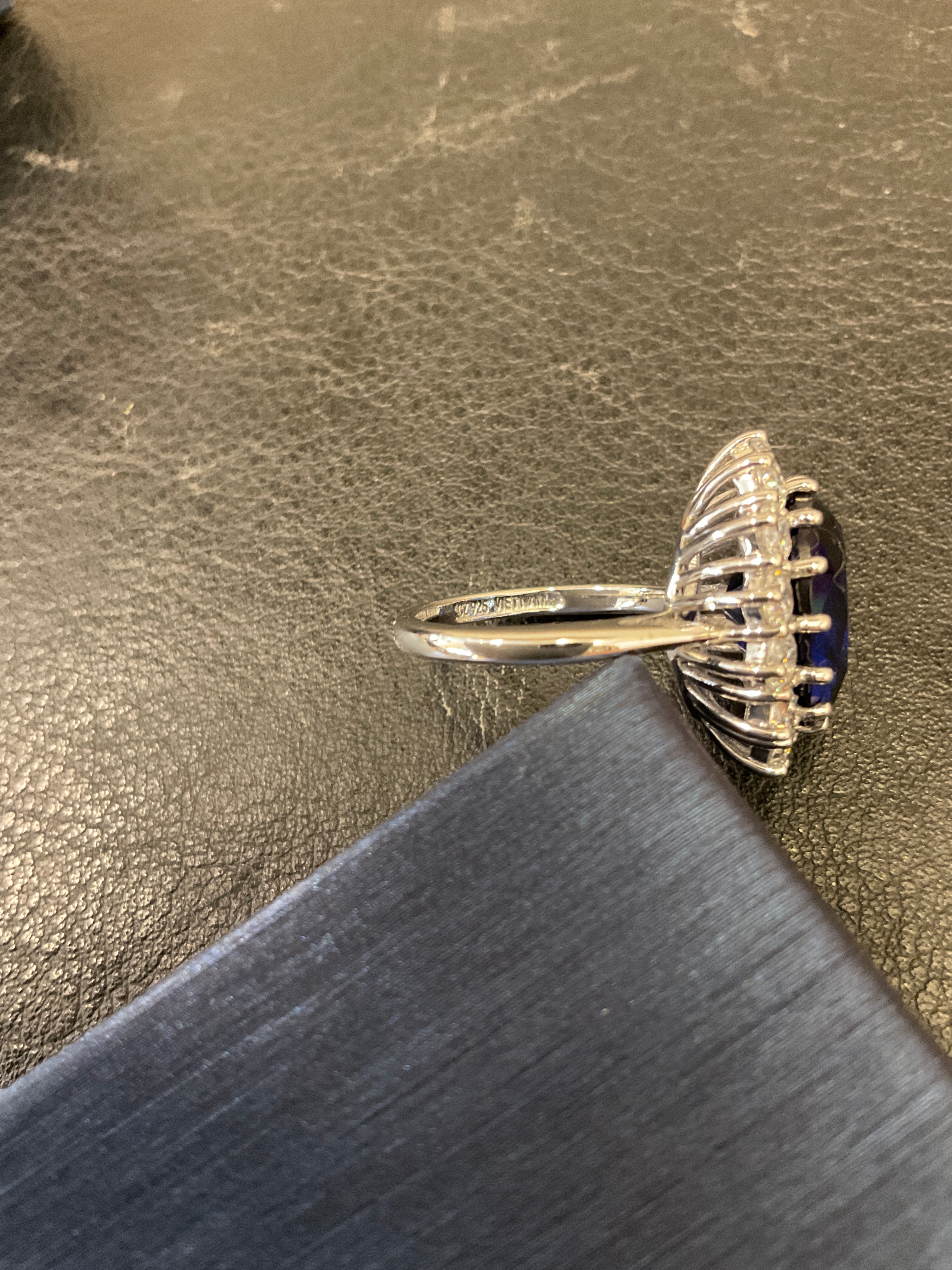 Vintage Art Deco Style Cocktail Ring with Large Oval Solitaire AAA CZ Baguette Halo Simulated Sapphire Blue