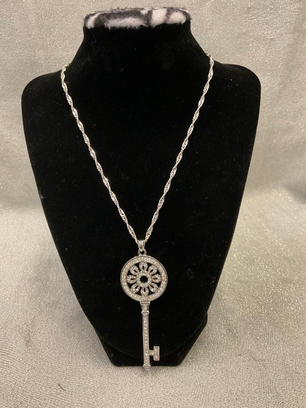 Silver necklace with large key pendant
