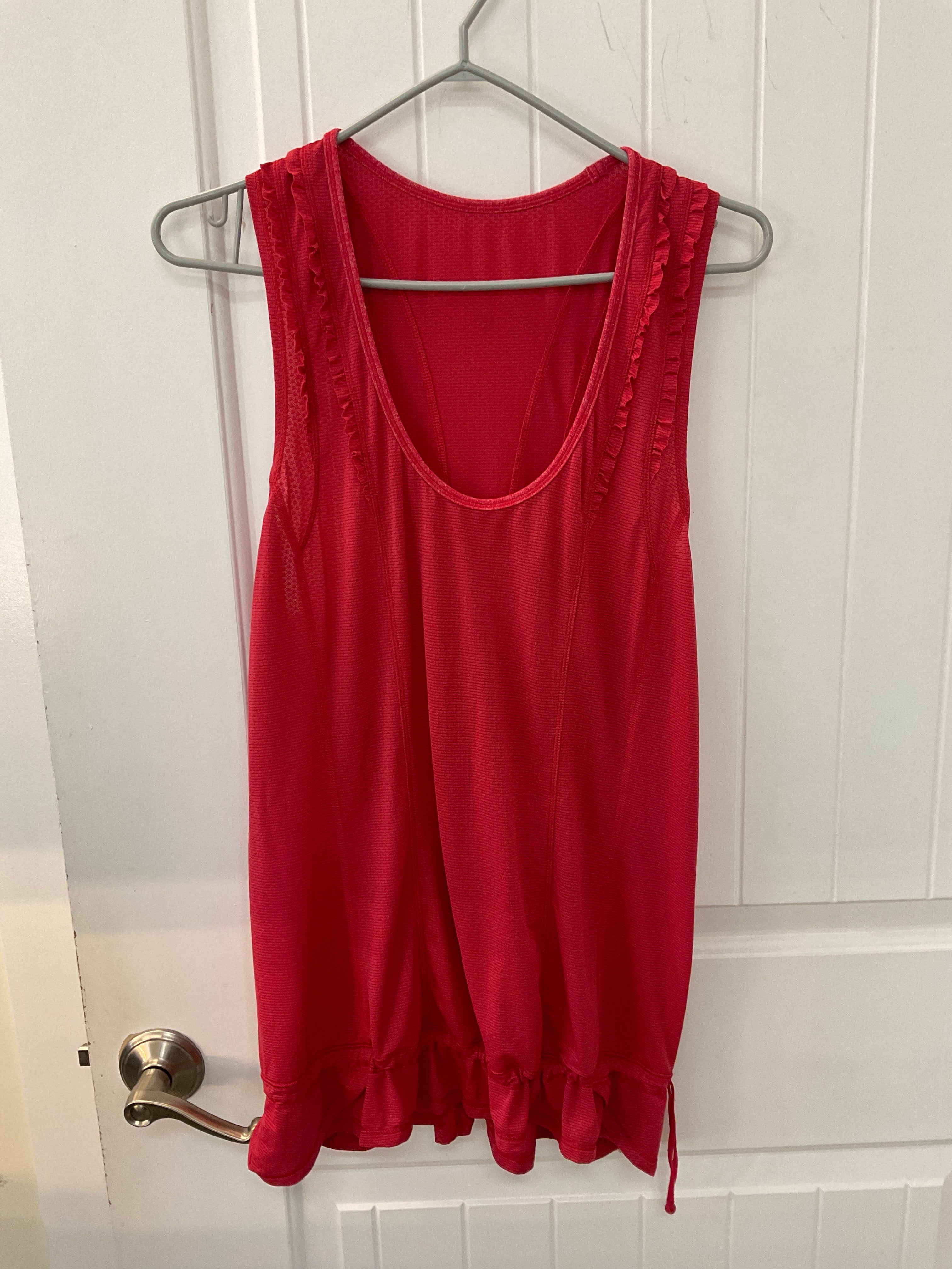 Lululemon top size 12 light red colour