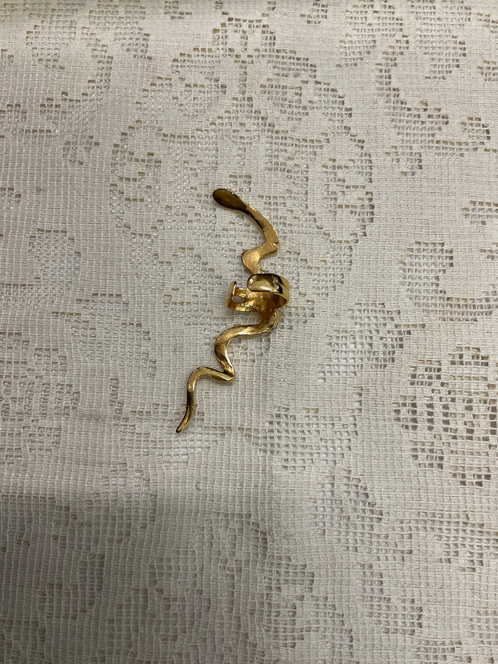 Gold toned snake ear cuff