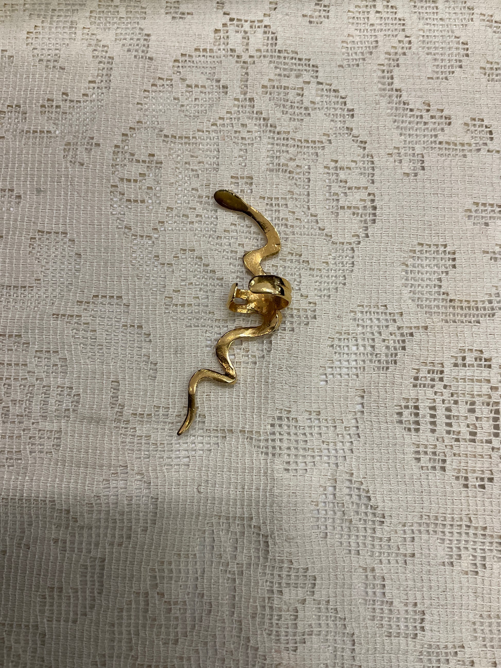 Gold toned snake ear cuff