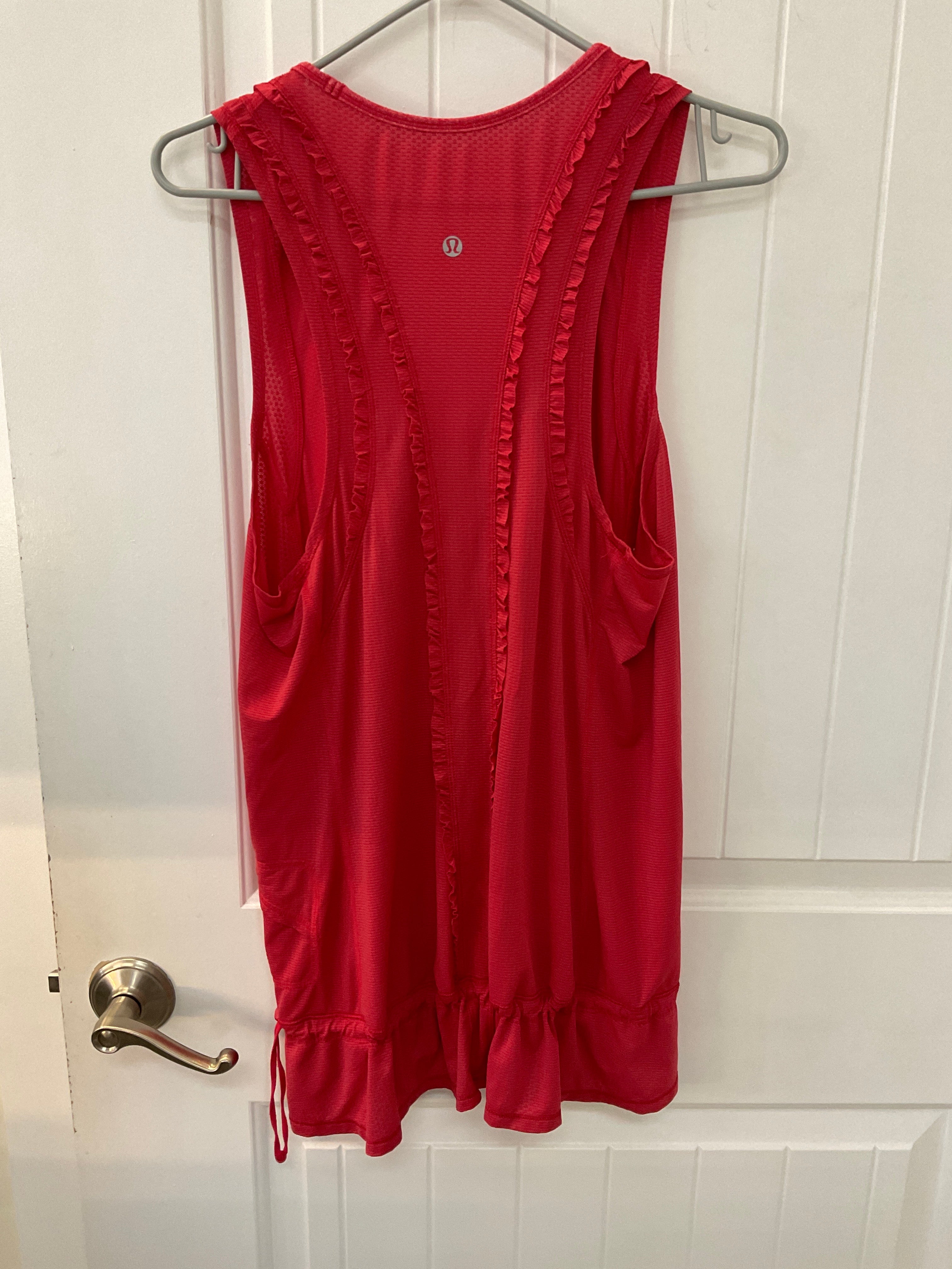 Lululemon top size 12 light red colour