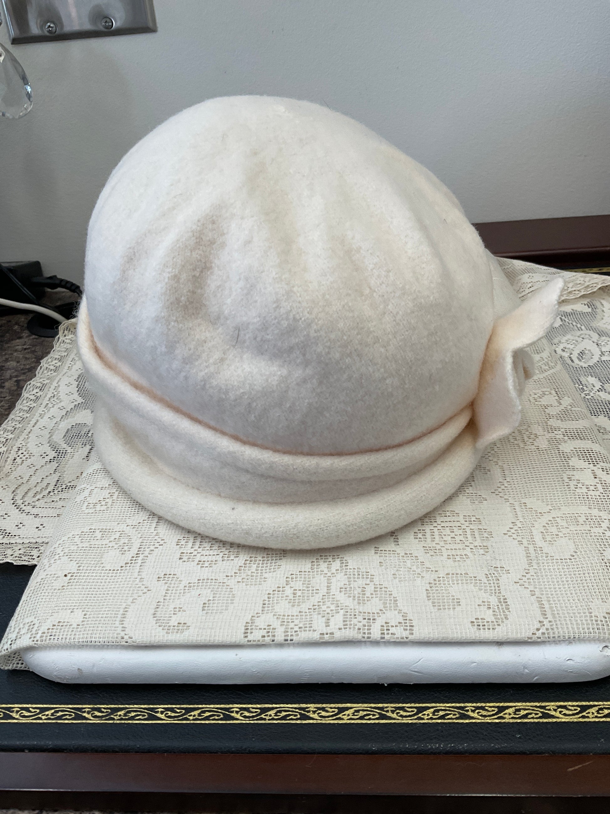 100% wool slouch hat with flower accent