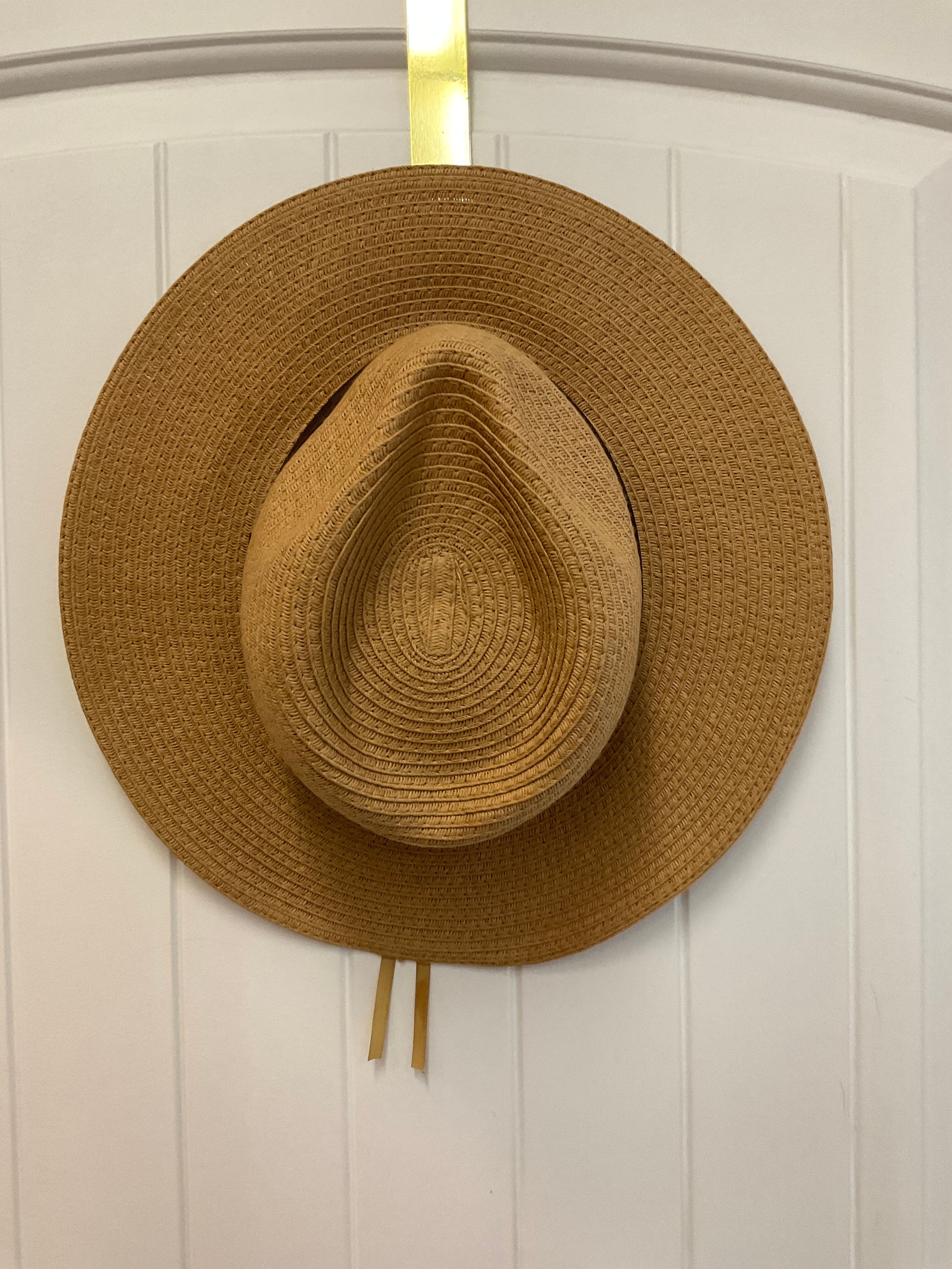 Paper hat with brown ribbon