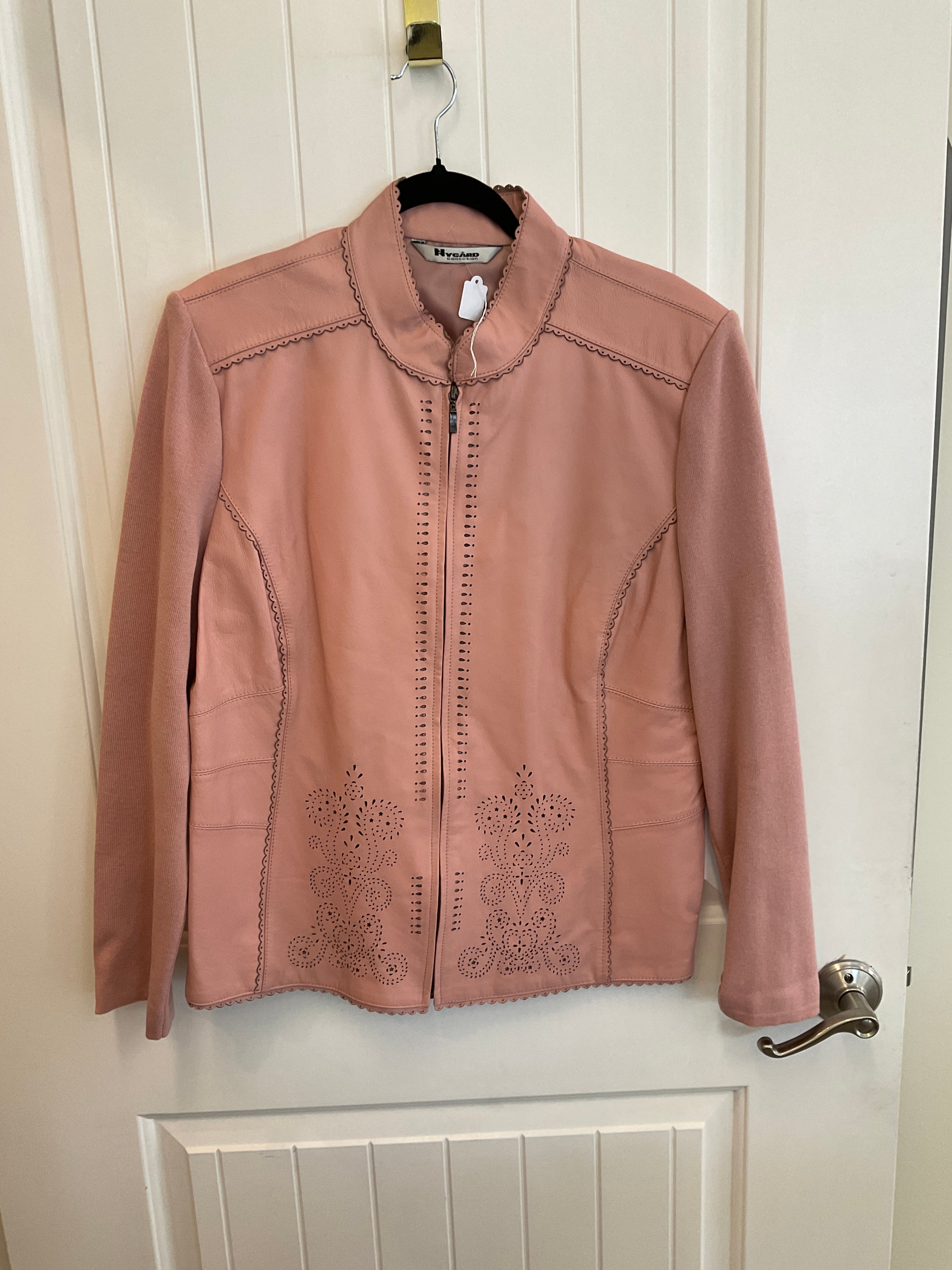 Pink leather jacket with knit sleeves