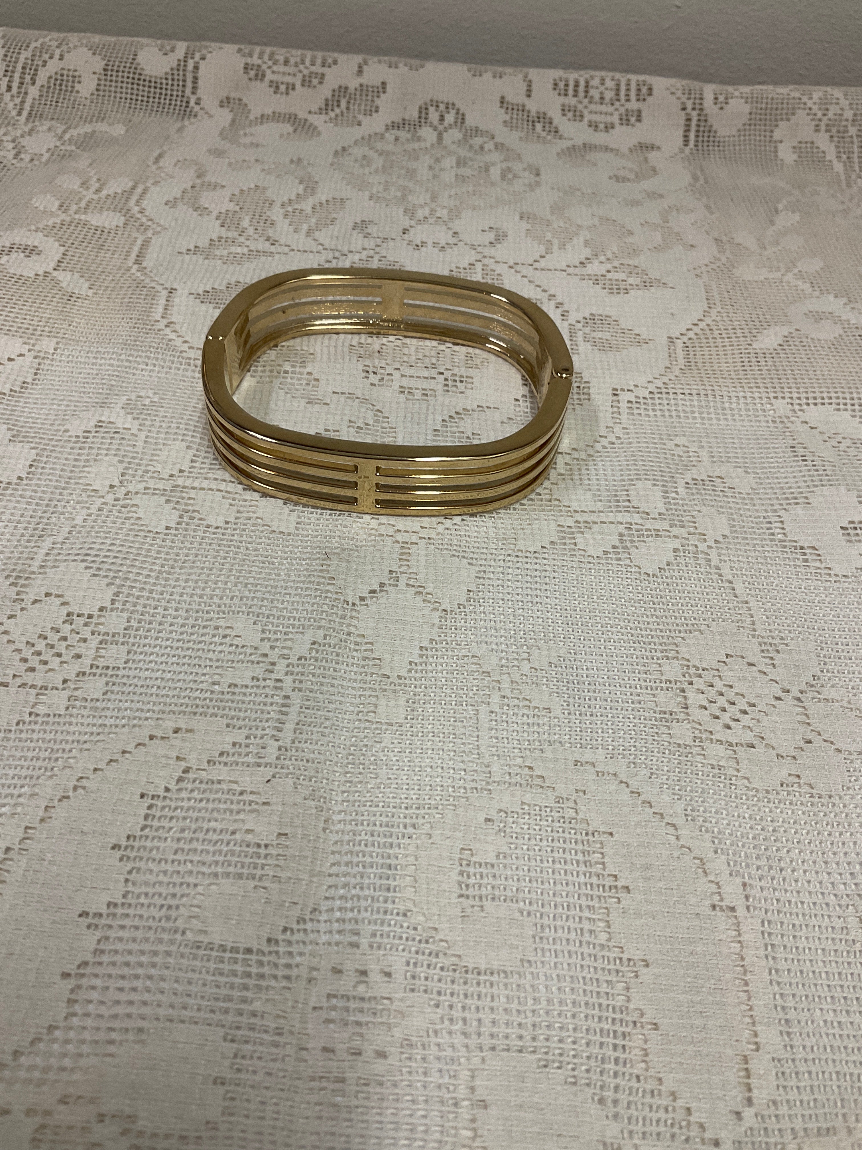 Gold cuff bangle