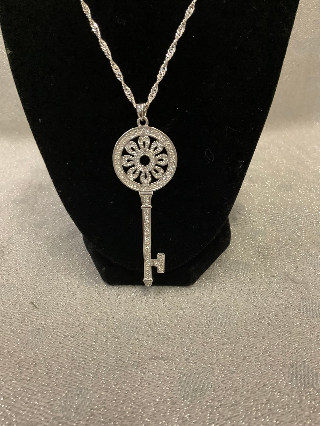Silver necklace with large key pendant