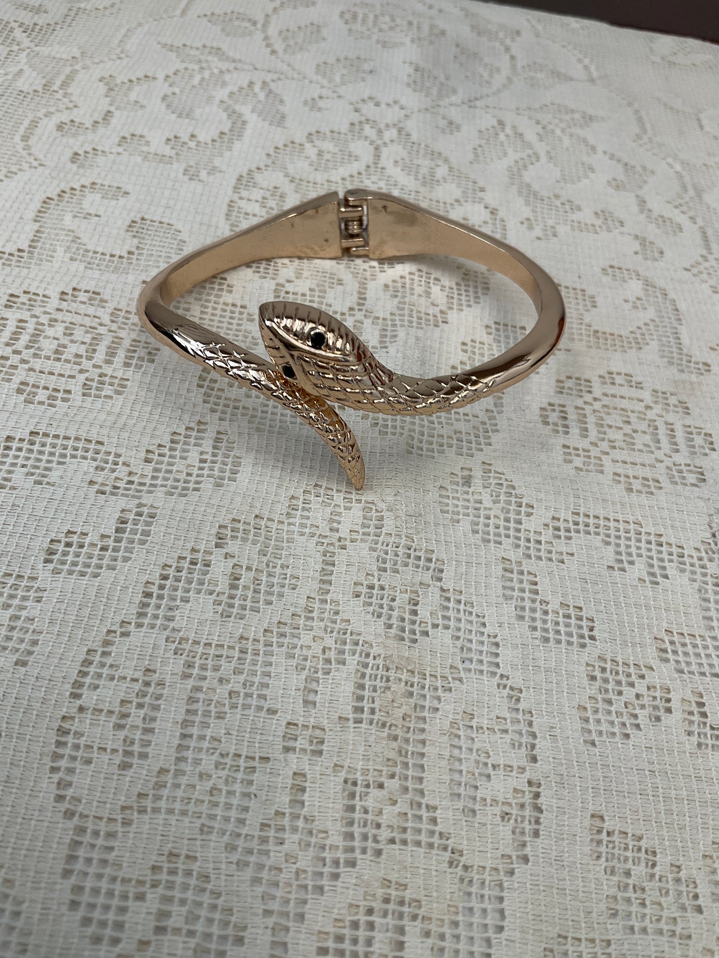 Gold snake cuff