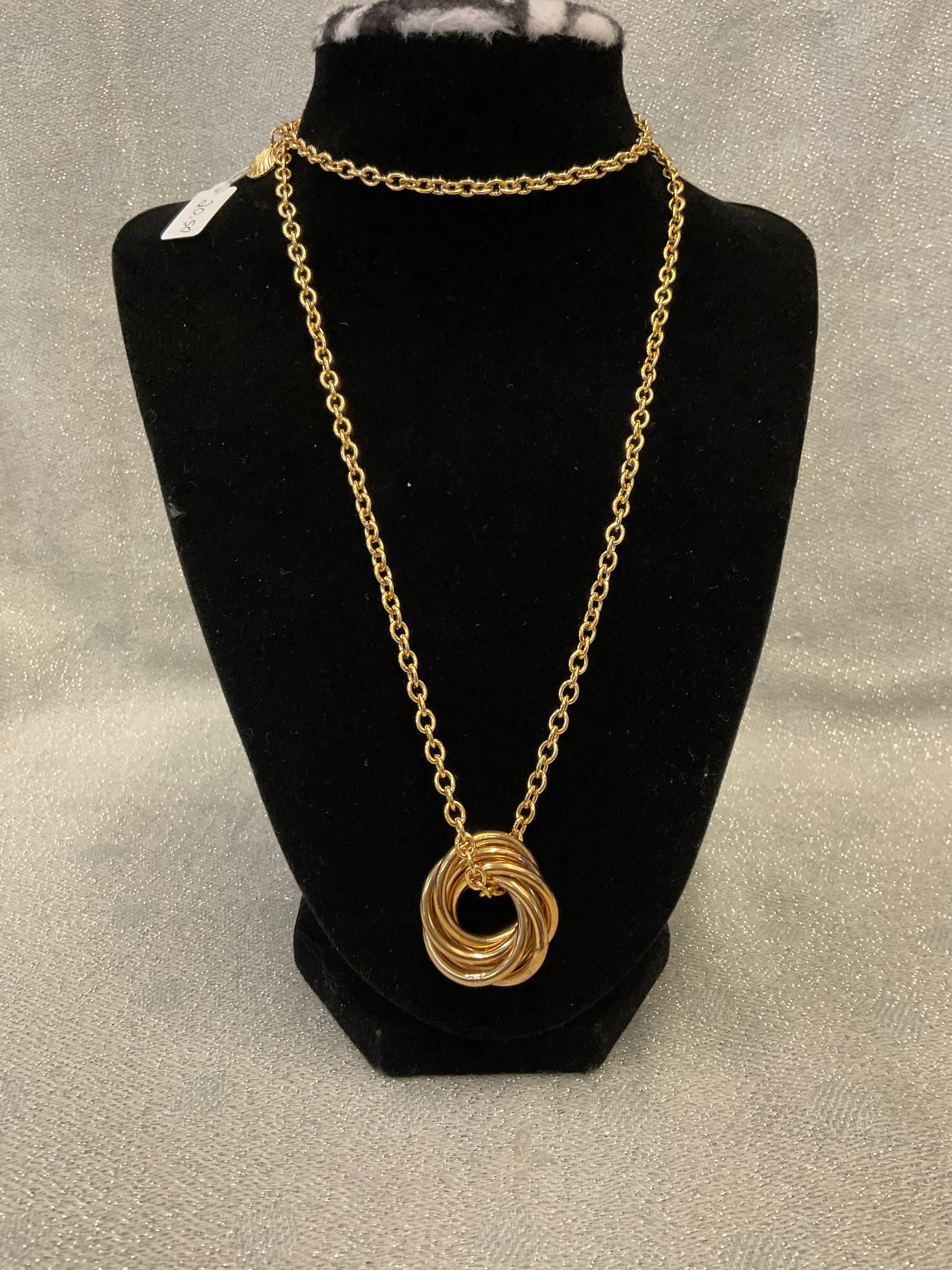 Gold tone long chain necklace with a multi ring pendant