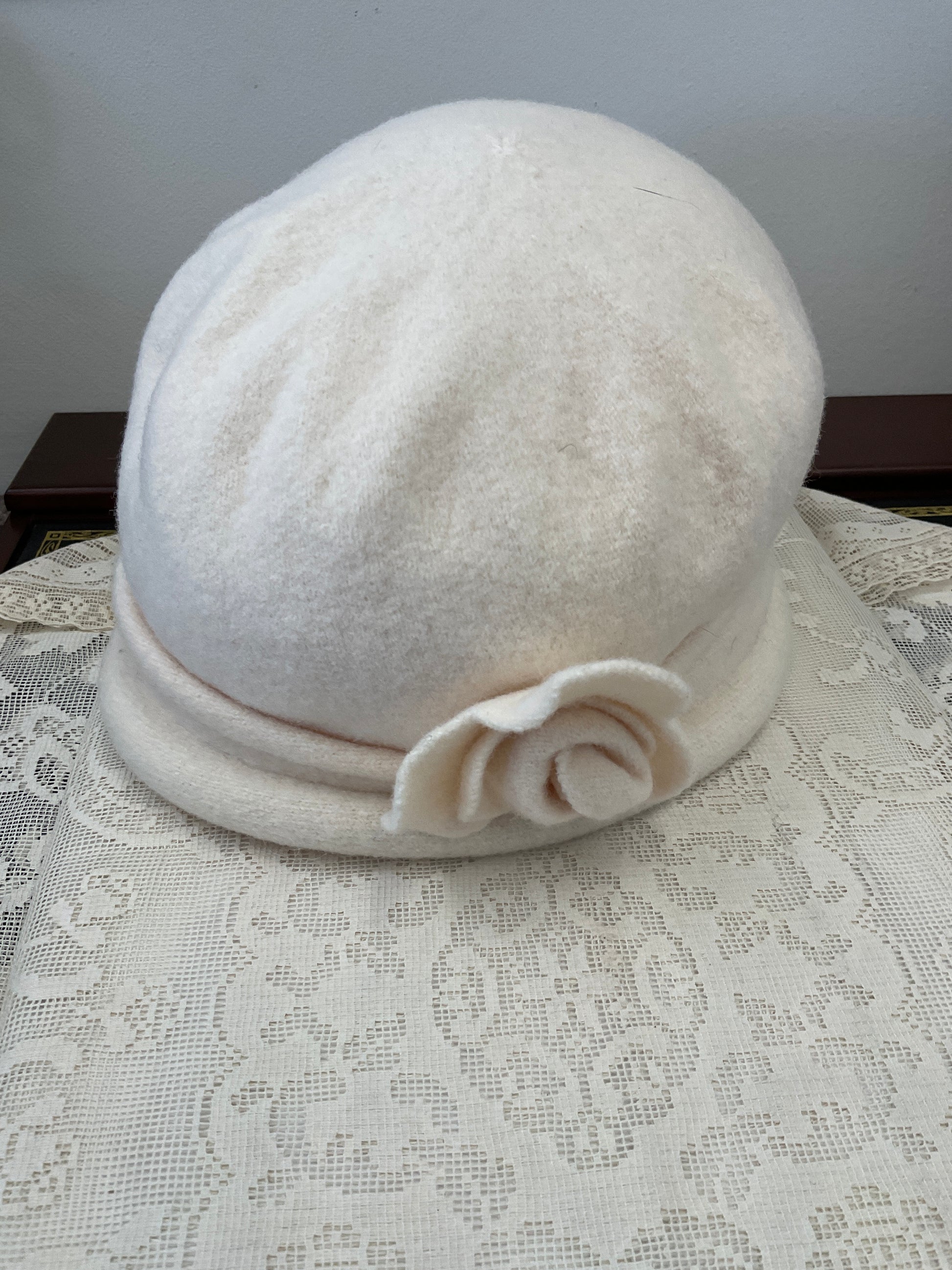 100% wool slouch hat with flower accent