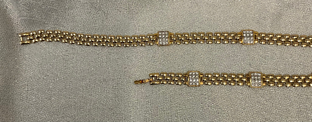 Gold toned bracelet and necklace set