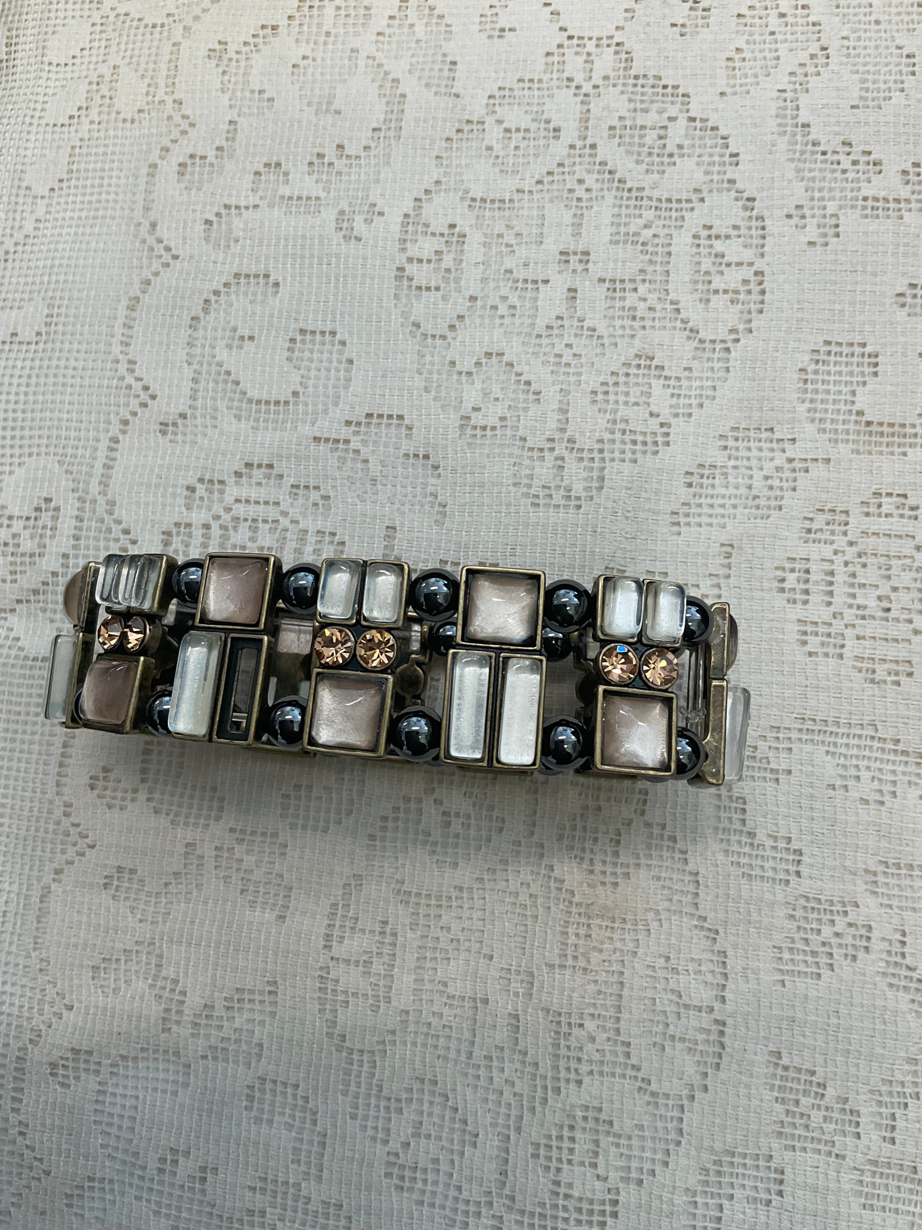 Gold toned bracelet with beads