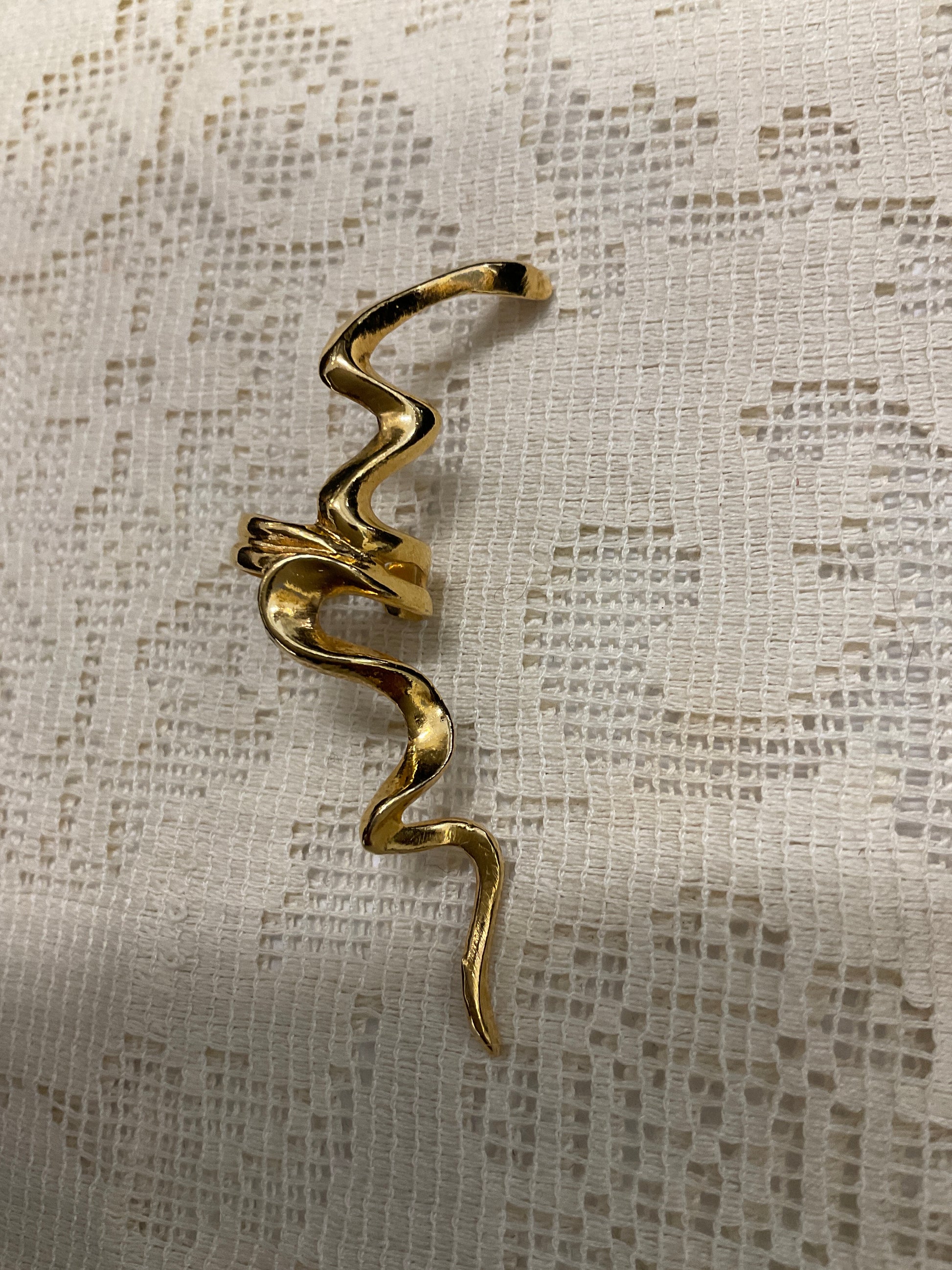 Gold toned snake ear cuff