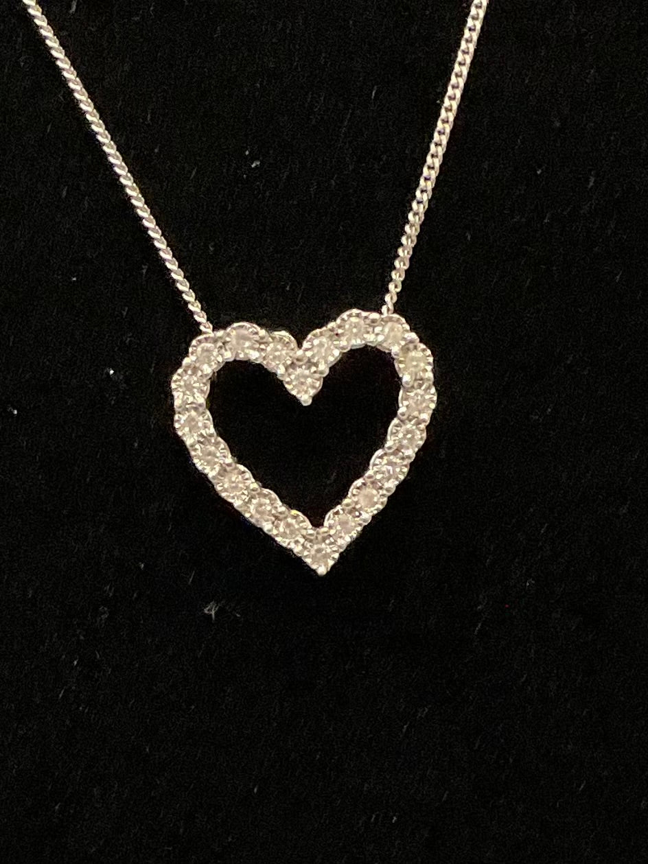 Silver necklace with small heart pendant