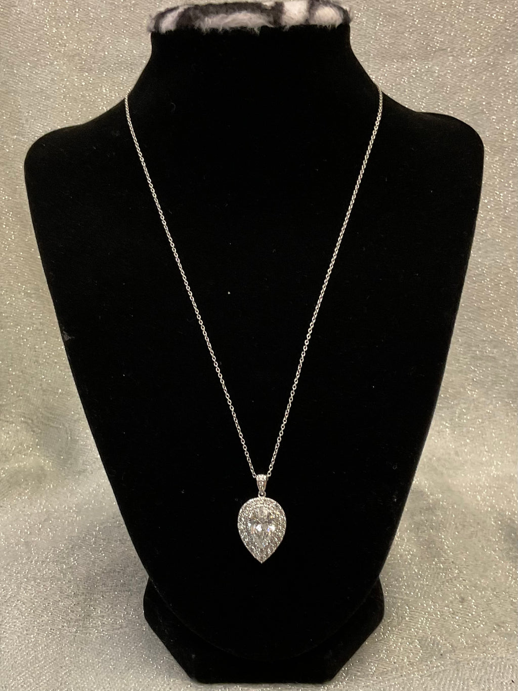 Silver necklace with tear shaped pendant