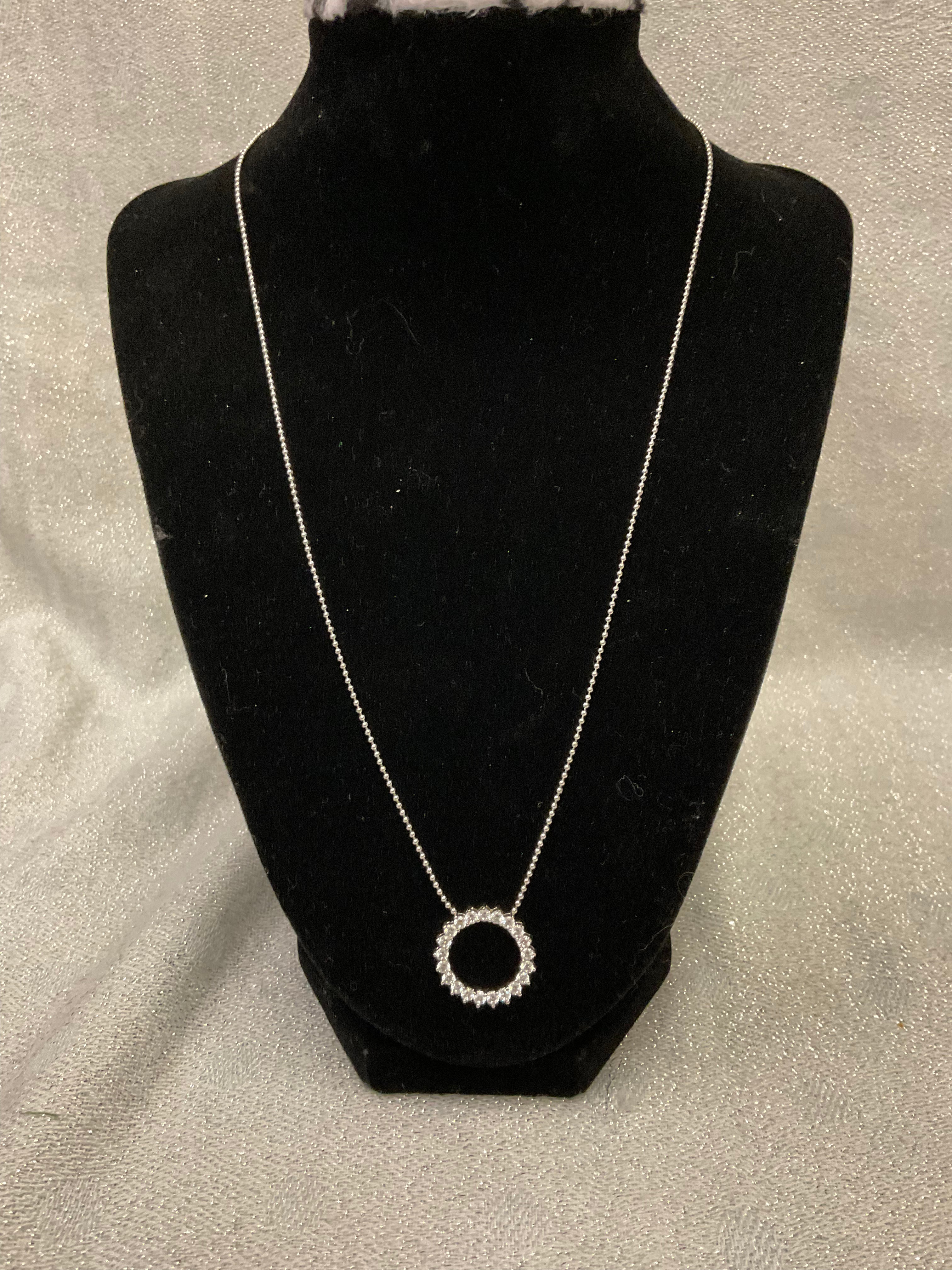 Silver necklace with diamond circle pendant