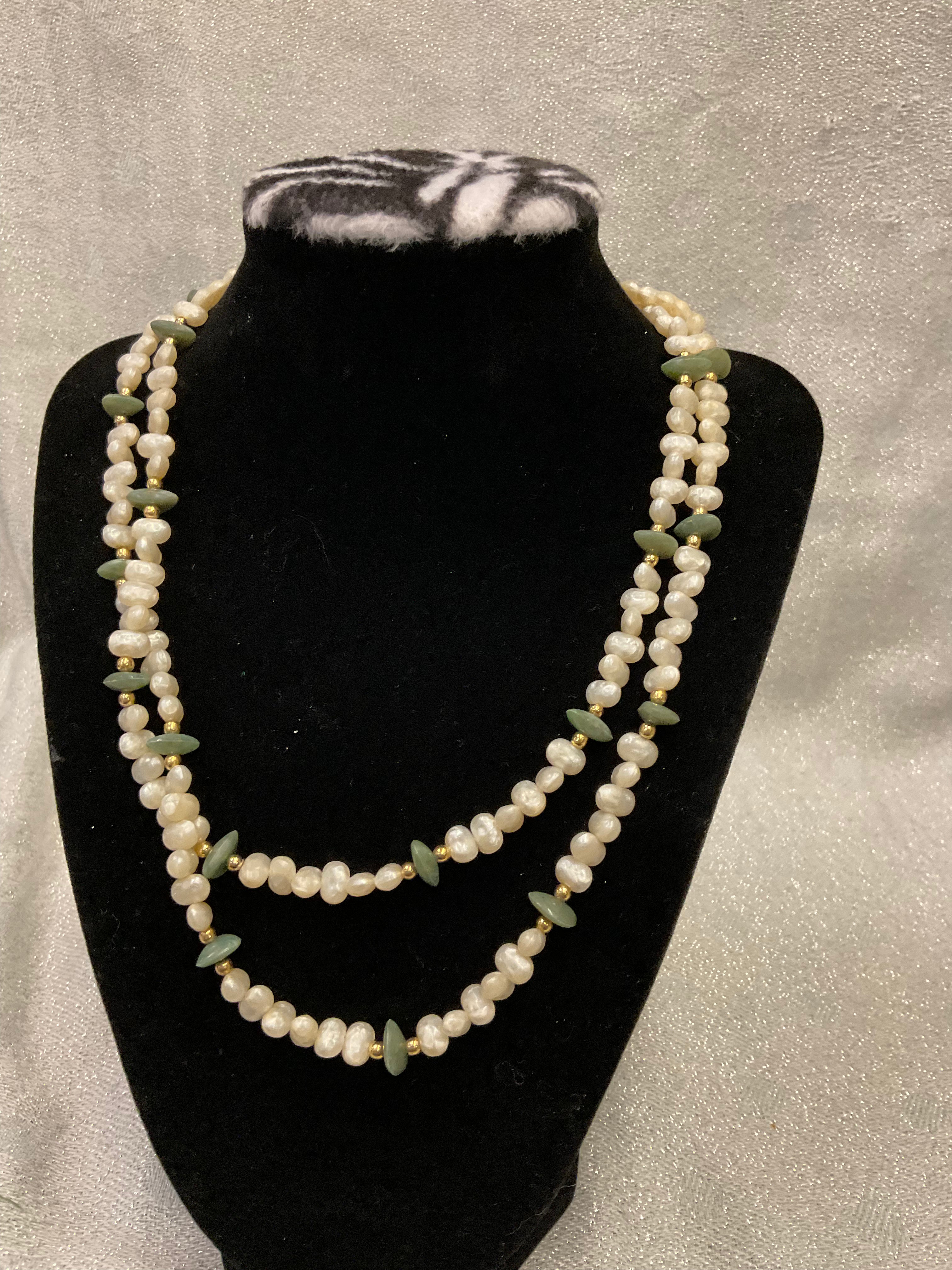Green and white beaded necklace