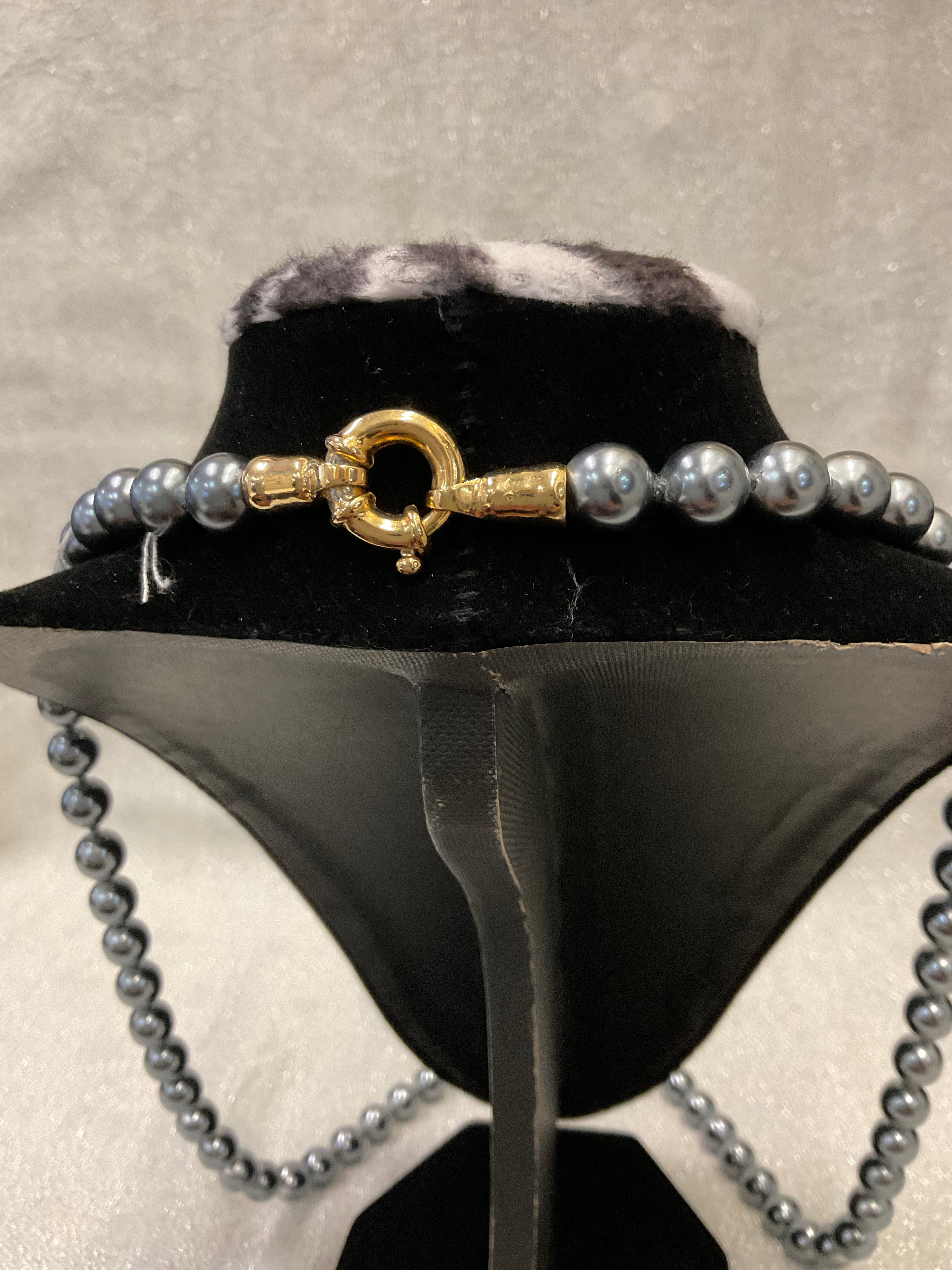 Blue pearl necklace with chunky gold clasp