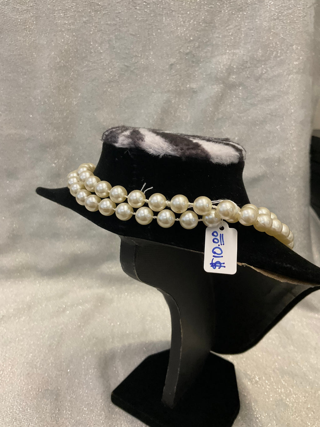 Faux single stranded long pearl necklace