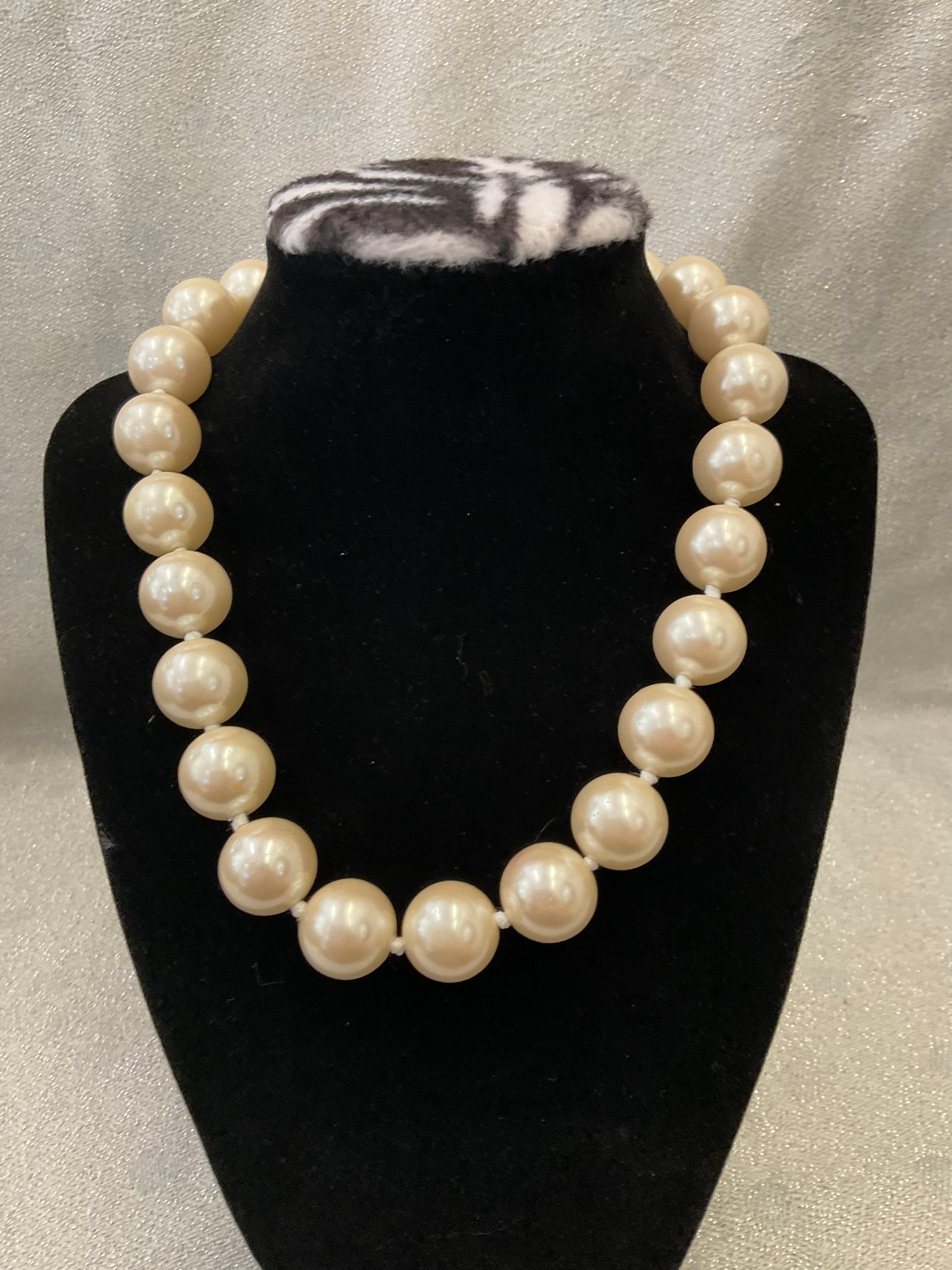 Large pearl necklace with statement clasp