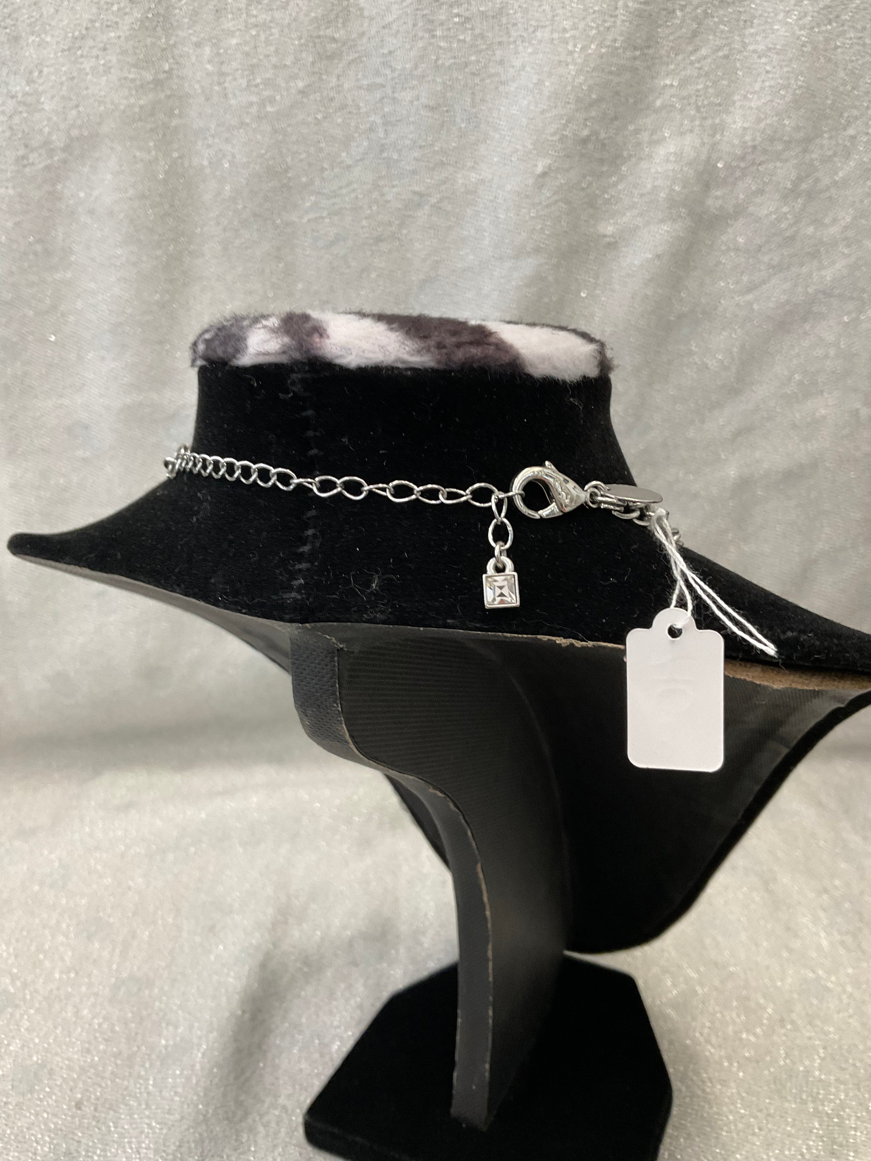 Triple stranded silver beaded necklace